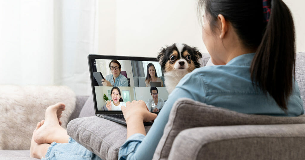 Live Streaming Guide Tip: A woman joins a video conference meeting, which is not to be confused with a live stream.