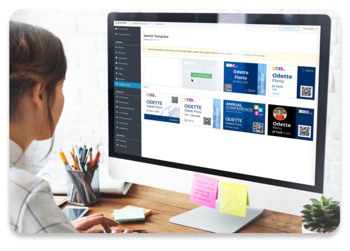 A person at a computer choosing an event badge template from EventMobi's Badge Designer tool.